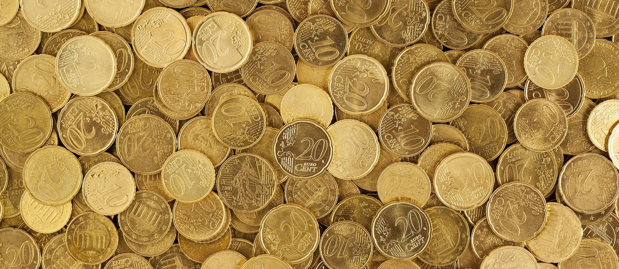 Zu sehen sind viele goldene Münzen.
